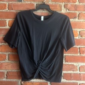 Lululemon size 6 black cotton T-shirt with gathering in front